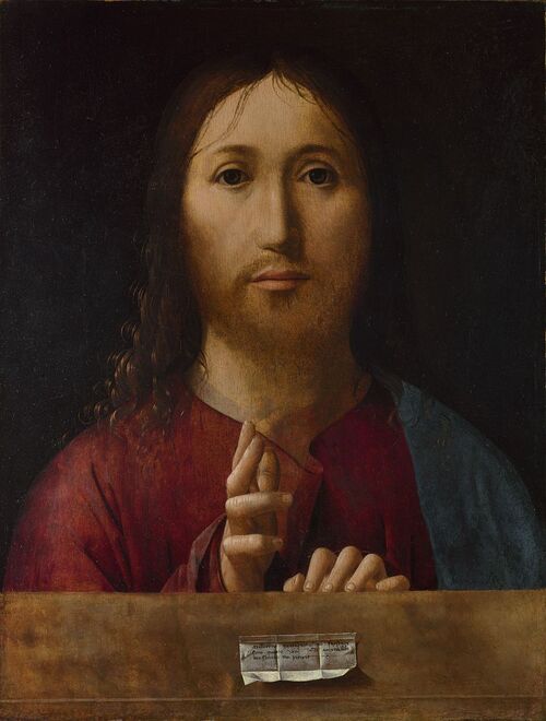 Cristo Bendiciente sobre tabla con la mano alzada en gesto de bendición, manto rojo y azul y cartelino de atribución